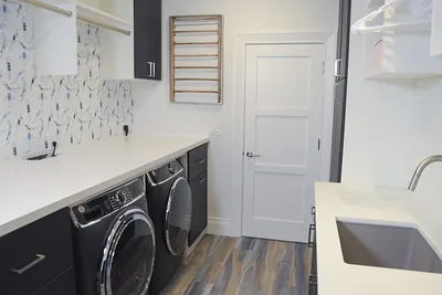 What goes into a custom laundry sink cabinet